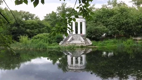 Rotunda is reflected in the pond Stock Footage 77200320