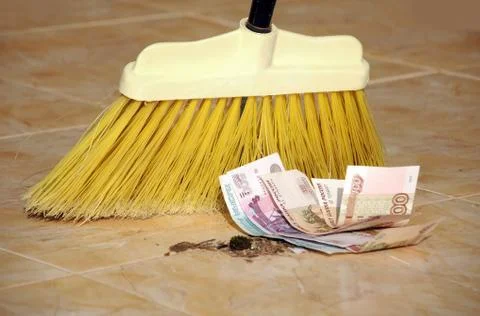 Roubles and broom Stock Photos