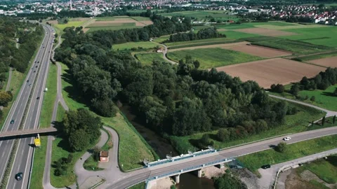 Roud next to river - aerial view Stock Footage