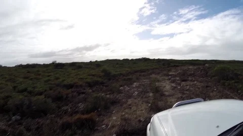 Rough 4x4 offroad driving through bushes Stock Footage 70767445