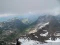 Rough alp mountains and green and snowy mountain peaks landscape in Switzerland Photo