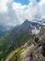 Rough alp mountains and green and snowy mountain peaks landscape in Switzerland Photo
