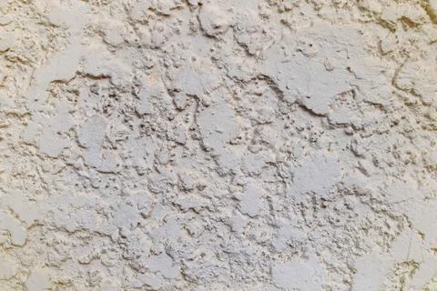 Rough and chunk surface white cement wall with vignette. Stock Photos