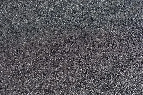 Rough asphalt pavement surface texture Stock Photos