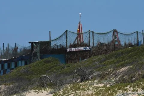 Rough Beach Hide Camp With Nets And Poles Stock Photos