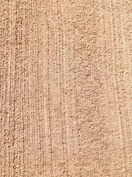 Rough beige stucco wall texture background Foto stock