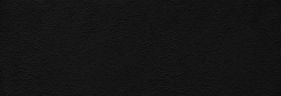 Rough black plaster on the wall for background Stock Photos