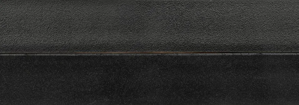 Rough black plastic texture surface Stock Photos