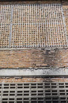 Rough Brick Texture Of Building Wall Stock Photos