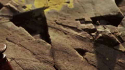 Rough Brown Stone Surface in Bright Sunlight Stock Footage 348110962