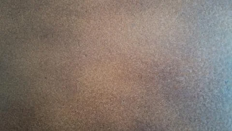 Rough brown stone texture with natural weathered patterns and grainy detail 스톡 사진