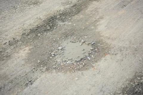 Rough bumpy stone road in rural Stock Photos