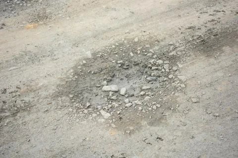 Rough bumpy stone road in rural Stock Photos