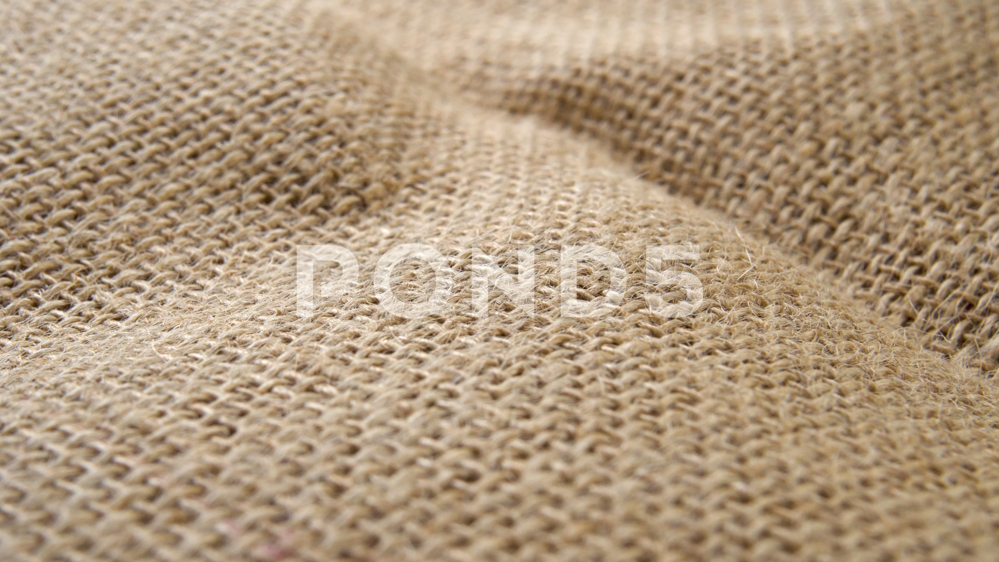 Textured linen or cotton burlap with binding brown fibres. Rough