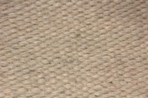 Rough camel wool fabric texture taken closeup.Background. Stock Photos