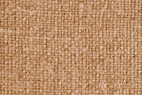Rough canvas macro texture and background with light center Foto stock