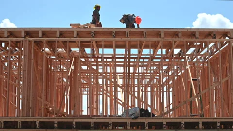 Rough-in Carpenters Work on New House Stock Footage 210264057