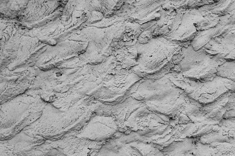 Rough cement plaster on the wall. Facade plaster background. Single-ply monol Stock Photos
