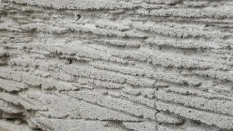 Rough Cement Plaster Wall Texture, Unfinished Concrete Surface Background Stock Footage 339237803