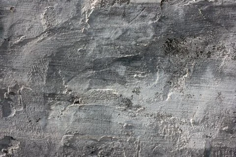 A rough cement wall texture. Old real gray concrete background Stock Photos
