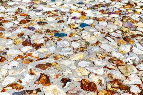 Rough cobblestone pavement on the road as creative background texture. Natu.. Foto stock