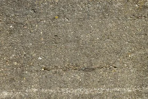 Rough Concrete Building Wall Texture Background and small pebble stones Stock Photos