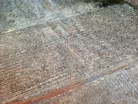 Rough Concrete Road Surface With Weathered Linear Texture Stock Photos