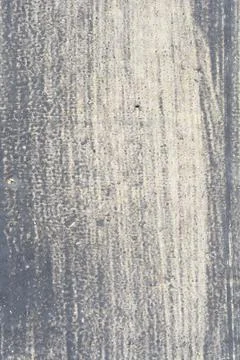 Rough concrete surface with faded grey paint Stock Photos