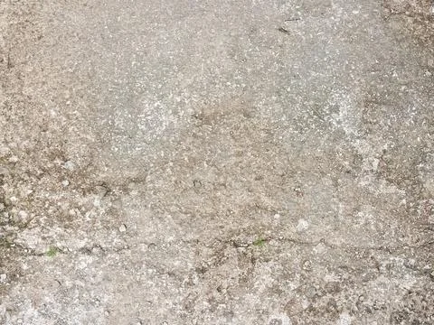 Rough concrete surface with subtle cracks, weathered texture Stock Photos