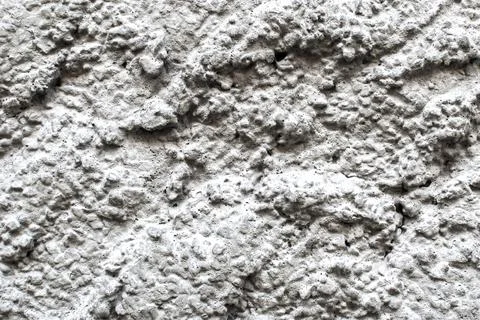 Rough concrete texture with strong relief pattern Stock Photos