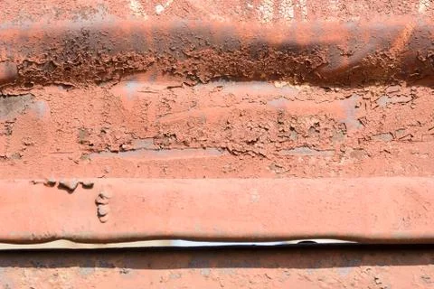Rough corrugated rust pattern on metal with copy space area Stock Photos