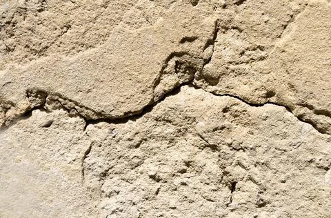 Rough cracked brown surface close-up.Texture or background Stock Photos