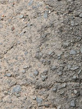 Rough Damaged Asphalt and Broken Concrete Texture 库存照片