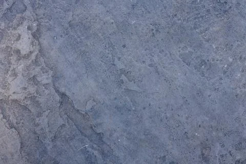 Rough dark gray texture of rock. Stock Photos