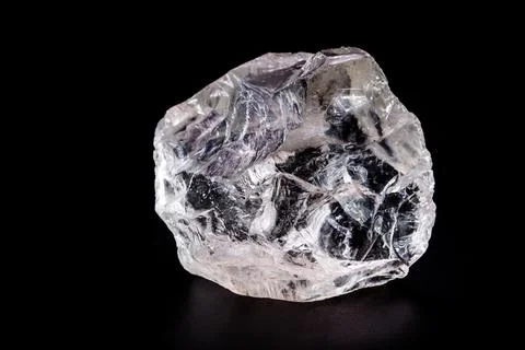 Rough diamond, crystal in an allotropic form of carbon, uncut gemstone, conce Stock Photos