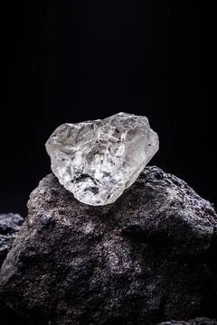 Rough diamond, crystal in an allotropic form of carbon, uncut gemstone, conce Stock Photos
