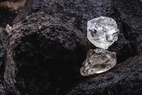 Rough diamond, crystal in an allotropic form of carbon, uncut gemstone, conce Stock Photos