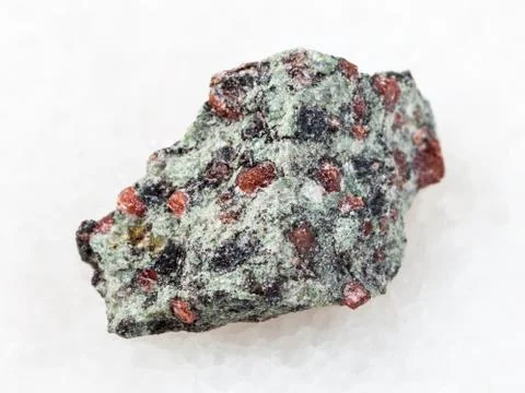 Rough eclogite stone on white Stock Photos