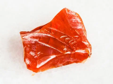 Rough fire opal gemstone on white Stock Photos