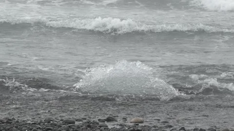 Rough Glacial Ice Chunk in Ocean Surf at Diamond Beach in Iceland Stock Footage 339952825