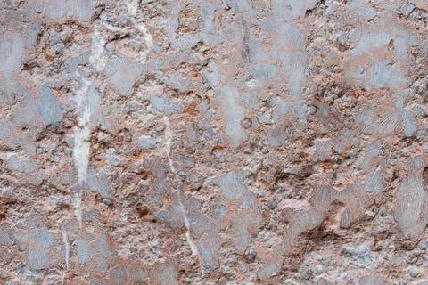 Rough granite stone surface forming detailed abstract patterns Stock Photos
