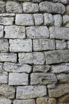 Rough gray bricks with a textured surface Stock Photos