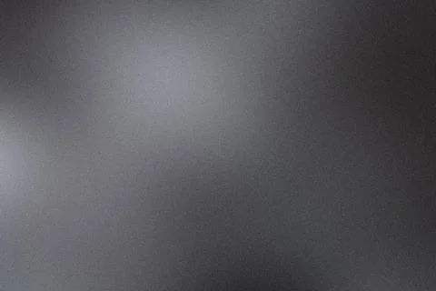Rough gray metallic surface background reflecting light Foto stock