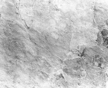 Rough gray stone surface forming abstract pattern 写真素材