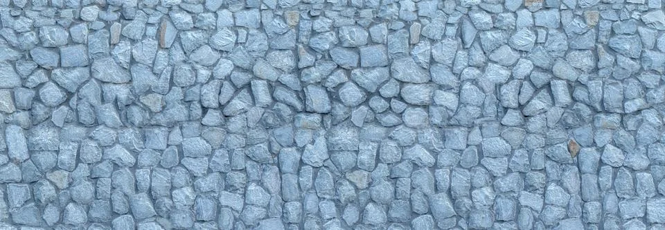 Rough gray stone wall creating textured background pattern 库存照片