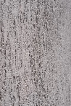 Rough gray stucco wall plaster texture background Stock Photos