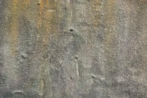Rough gray texture with yellow and beige spots in grunge style Stock Photos