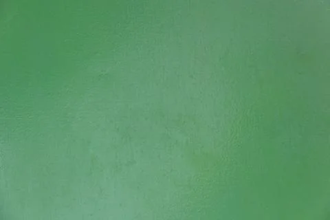 Rough green cement wall texture background Stock Photos