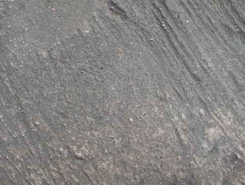 Rough grey concrete wall texture background with weathered cement surface Foto stock