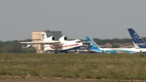 Rough landing on runway of Russian amphibious aircraft Be-200 Altair. Video stock 106967751